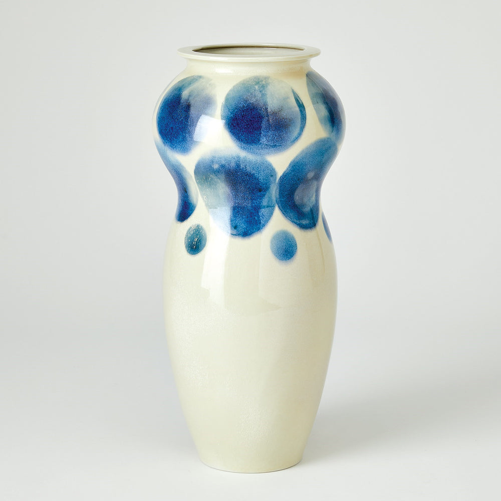 Taches vases et bol blanc avec des taches bleues