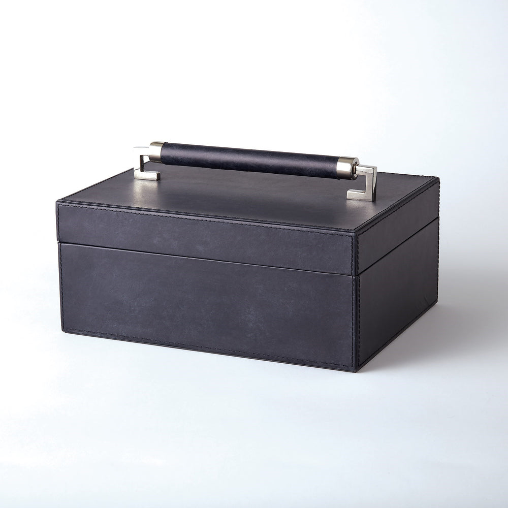 Boîtes à poignée en cuir enveloppées