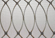  Vertical Elliptical Grille In Satin Chrome Plate with Floral Rosettes on Coarse Mesh