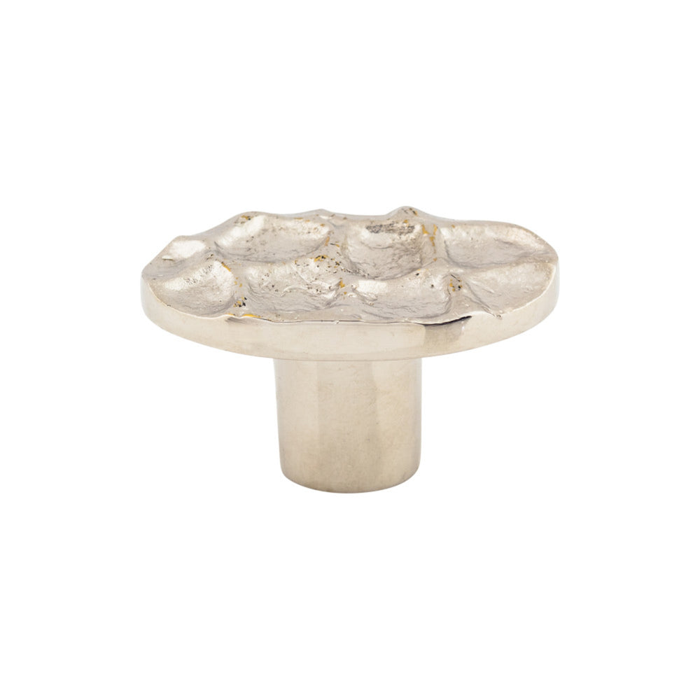 Bouton ovale pavé