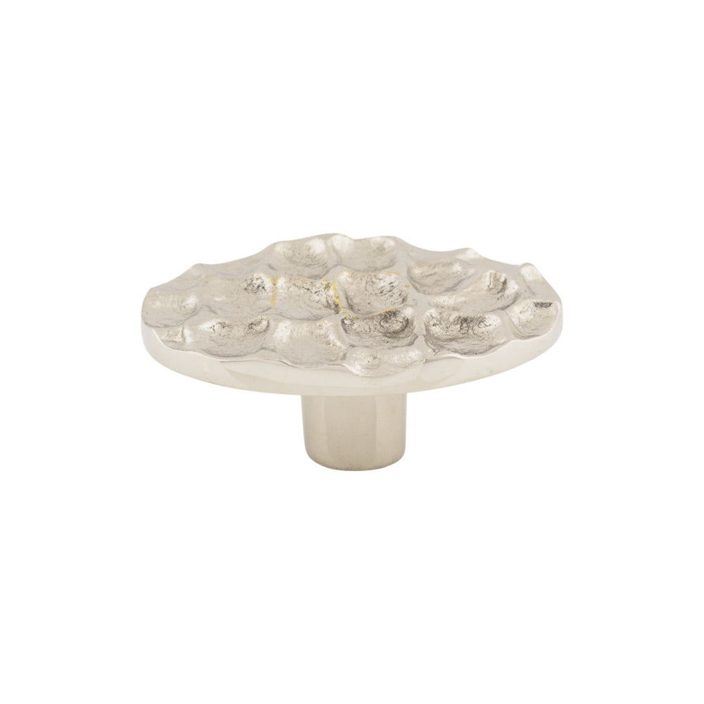 Bouton ovale pavé