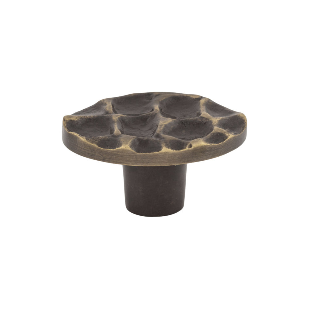 Bouton ovale pavé