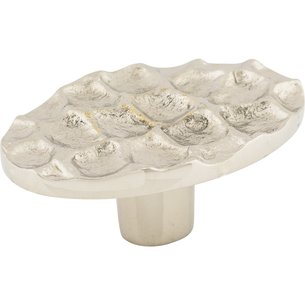 Bouton ovale pavé